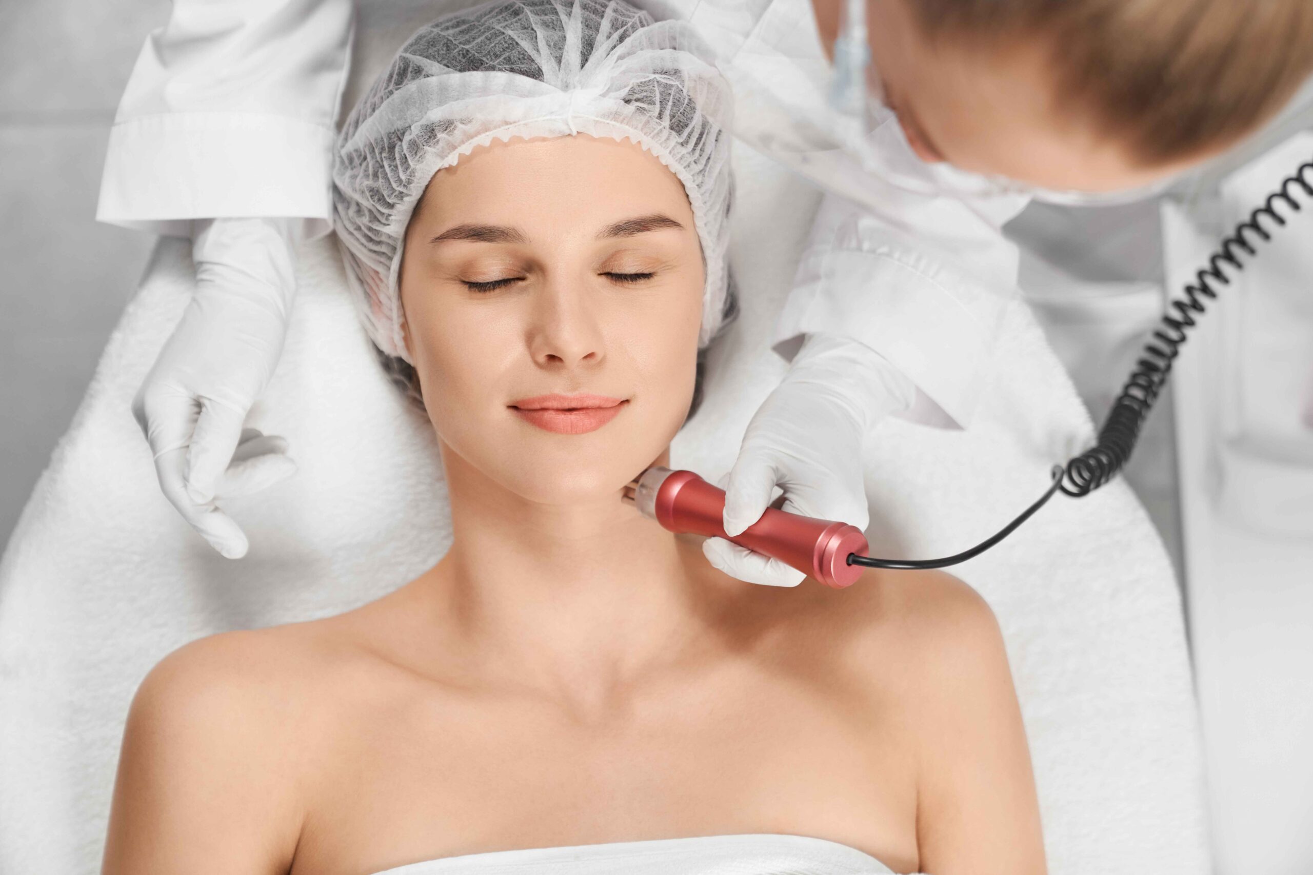 woman-enjoying-procedure-cleaning-massage-face_11zon
